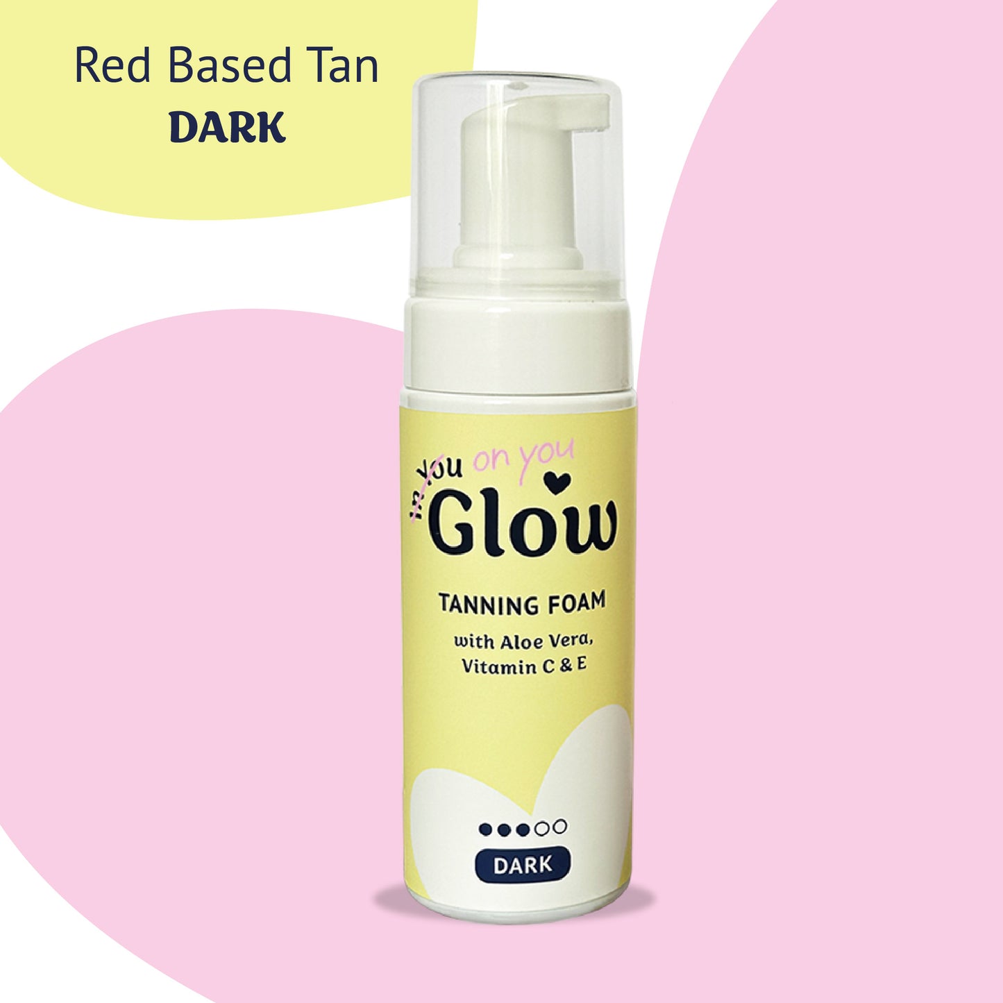 Tanning foam bottle with a yellow label on a pink background